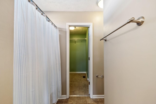 bathroom with a textured ceiling