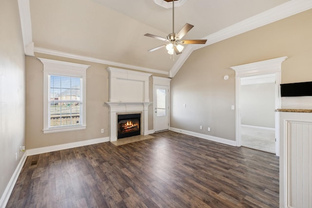 unfurnished living room with ornamental molding, dark hardwood / wood-style floors, ceiling fan, and lofted ceiling