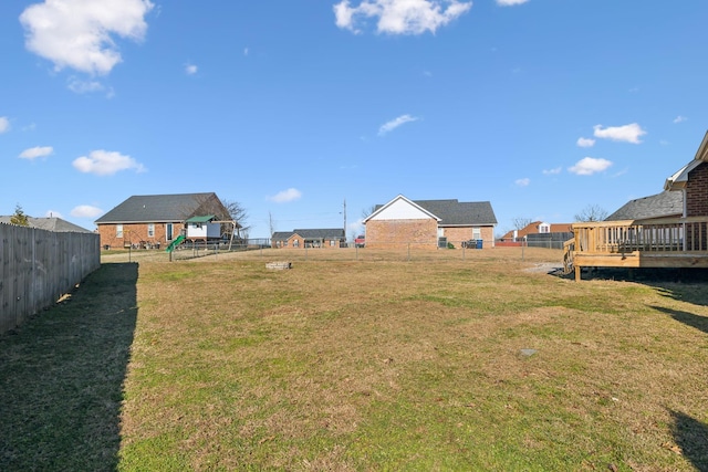 view of yard featuring a wooden deck