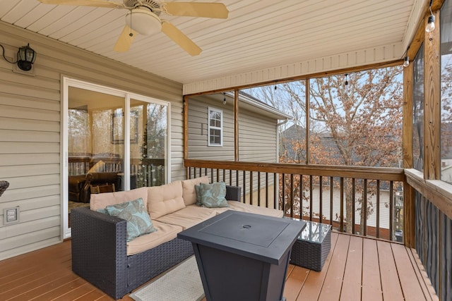 deck with ceiling fan and an outdoor hangout area