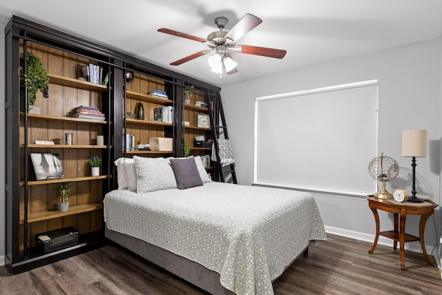 bedroom featuring dark hardwood / wood-style floors and ceiling fan