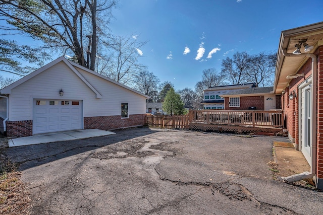 view of side of property with a deck