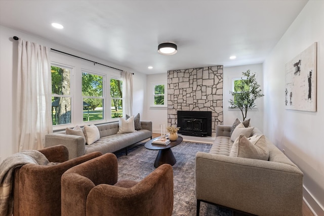 living room featuring a fireplace