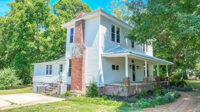 view of front of property featuring central AC unit