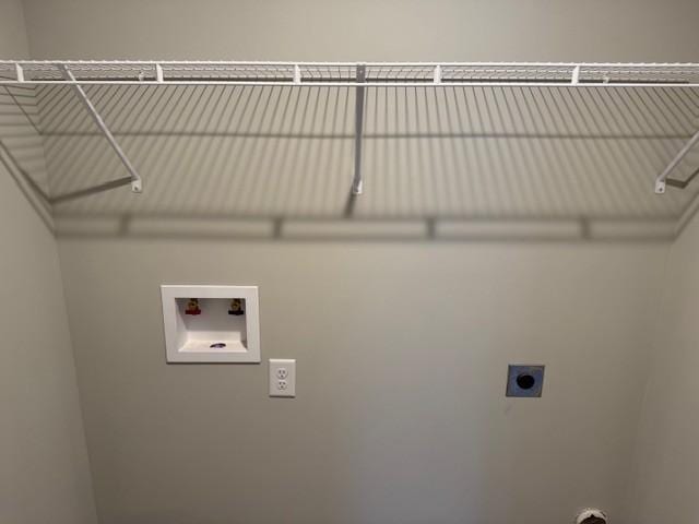 laundry room with hookup for a washing machine and electric dryer hookup