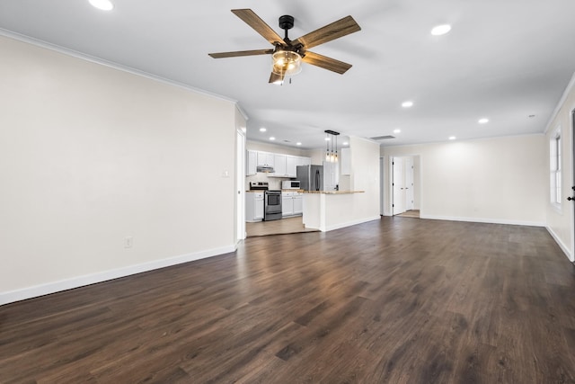 unfurnished living room featuring ceiling fan, ornamental molding, and dark wood-type flooring