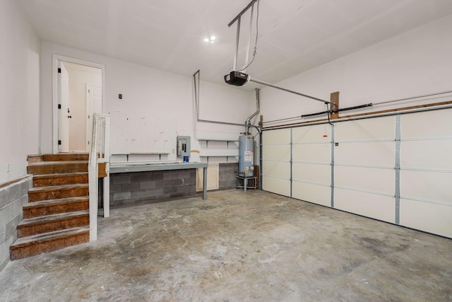 garage featuring electric panel, a garage door opener, and water heater