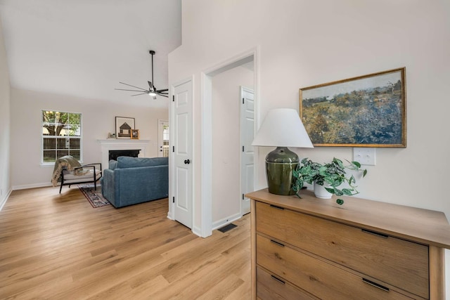 hall with light hardwood / wood-style flooring