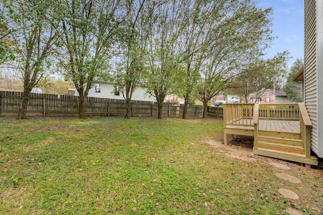 view of yard featuring a wooden deck