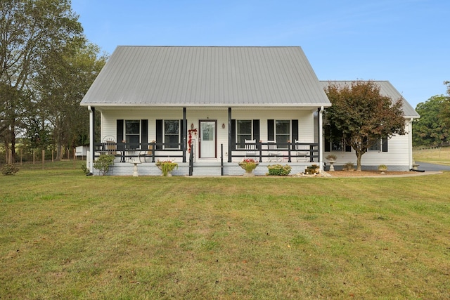 view of front of house featuring a front yard and a porch