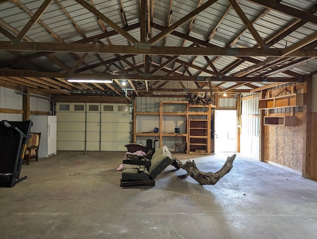 garage with white fridge