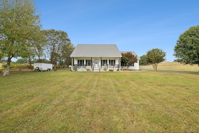 view of front of property with covered porch and a front lawn