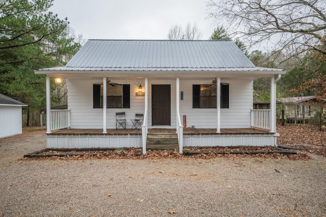 view of front of home with ceiling fan and covered porch