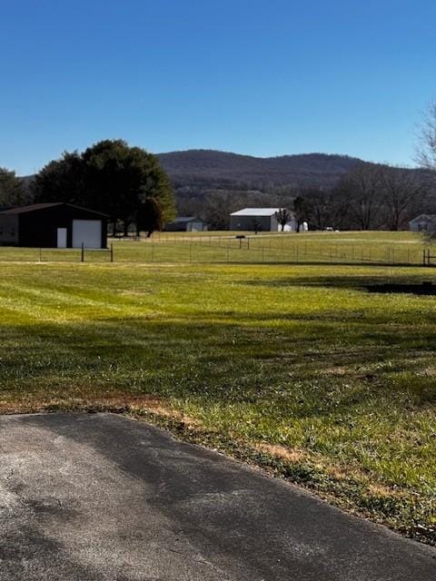 view of mountain feature featuring a rural view