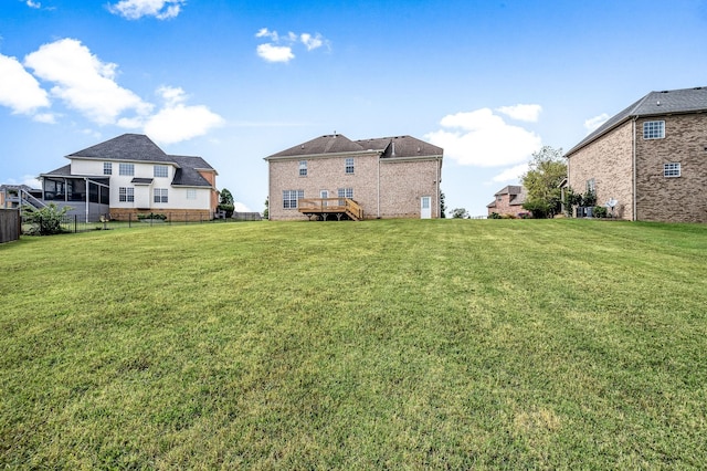 view of yard featuring a deck