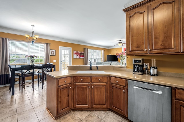 kitchen with ceiling fan with notable chandelier, sink, light tile patterned floors, decorative light fixtures, and dishwasher