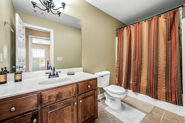 full bathroom with shower / bathtub combination with curtain, tile patterned flooring, vanity, and toilet