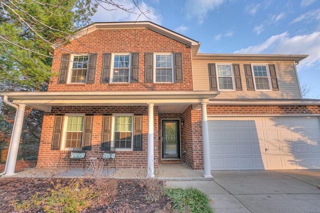 front of property with a garage