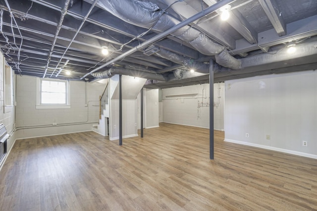 basement with wood finished floors