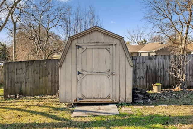 view of outdoor structure featuring a yard