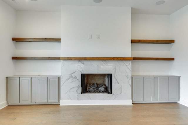 unfurnished living room with light hardwood / wood-style flooring