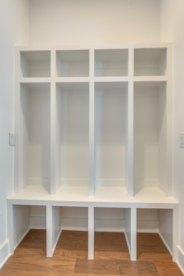 mudroom with hardwood / wood-style flooring