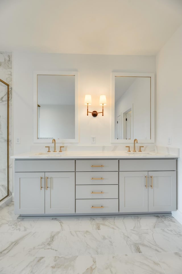 bathroom with vanity and an enclosed shower