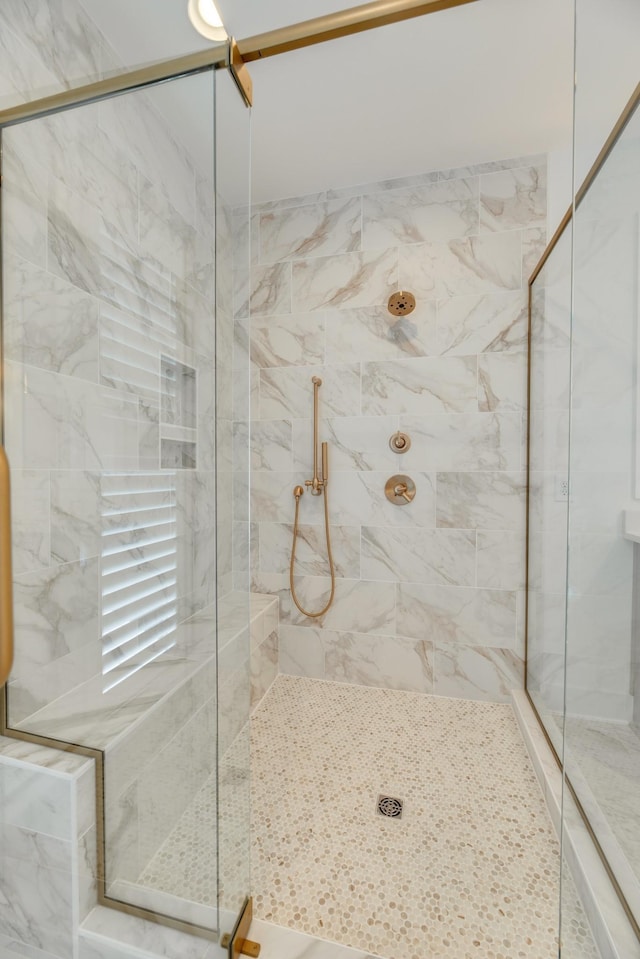 bathroom with an enclosed shower