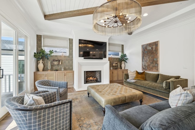 living room featuring beam ceiling, wood-type flooring, and a notable chandelier