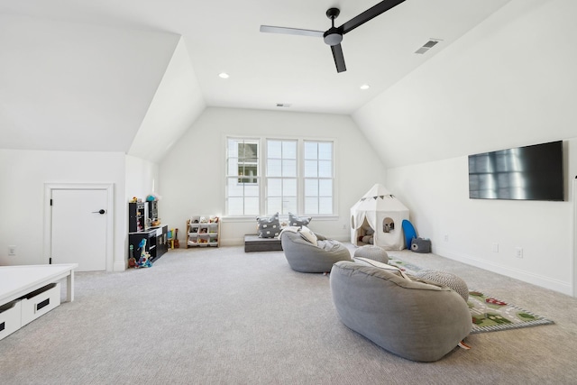 game room with ceiling fan, carpet floors, and vaulted ceiling