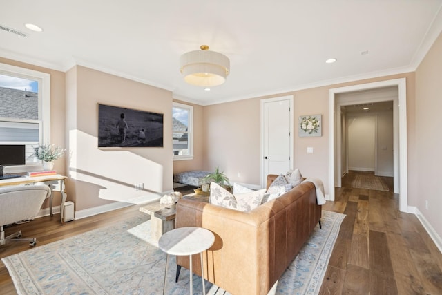 living room featuring crown molding and hardwood / wood-style floors