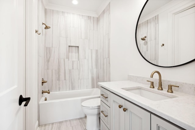 full bathroom featuring toilet, vanity, crown molding, and  shower combination