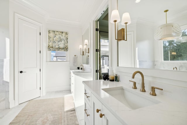 bathroom with vanity and crown molding