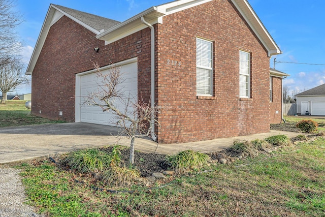 view of property exterior featuring a garage