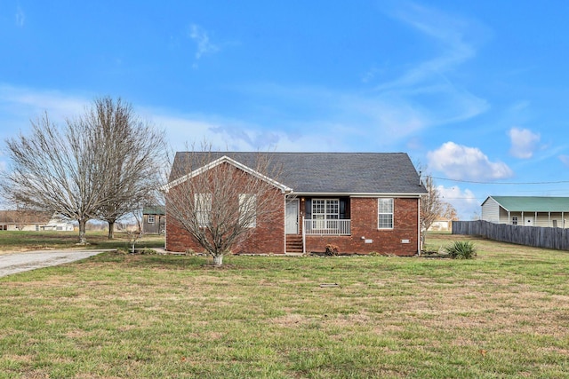 view of front of home with a front lawn