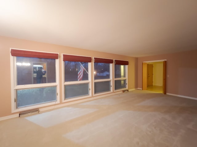 empty room with carpet floors