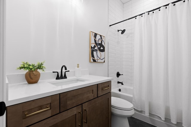 full bathroom featuring vanity, toilet, and shower / tub combo with curtain