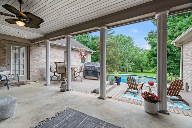 view of patio featuring ceiling fan