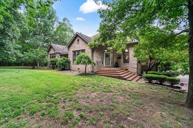 view of front of home with a front yard