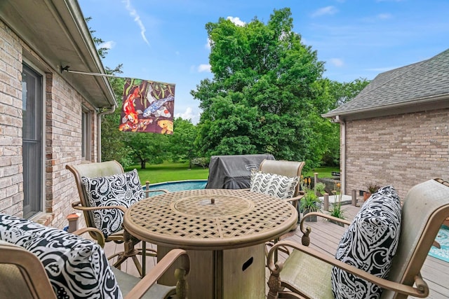 view of patio / terrace with a swimming pool side deck