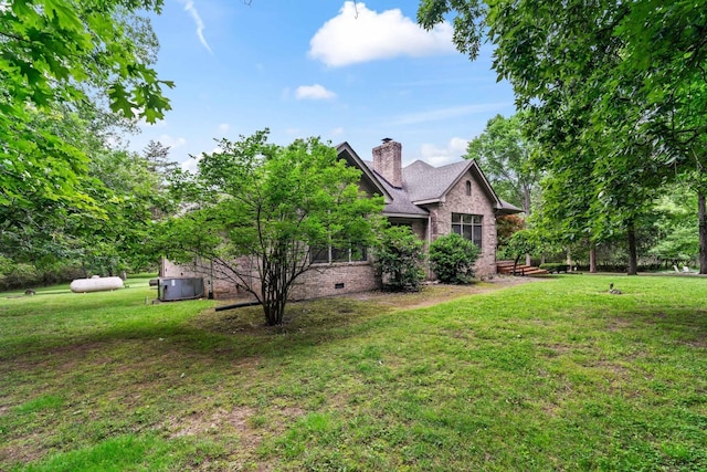 exterior space featuring a lawn