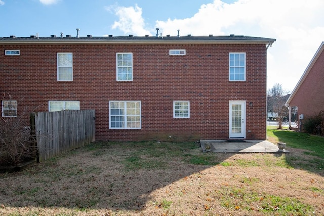 back of house with a patio