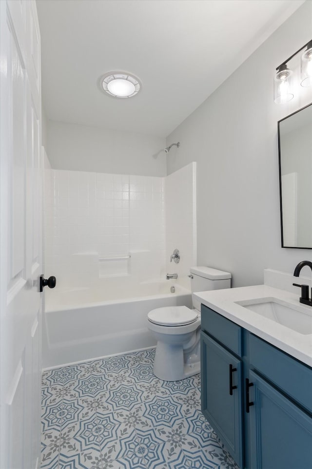 full bathroom with vanity, toilet, and shower / washtub combination