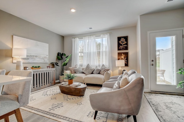 living room with hardwood / wood-style floors