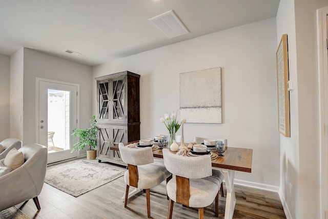 dining room featuring light hardwood / wood-style flooring