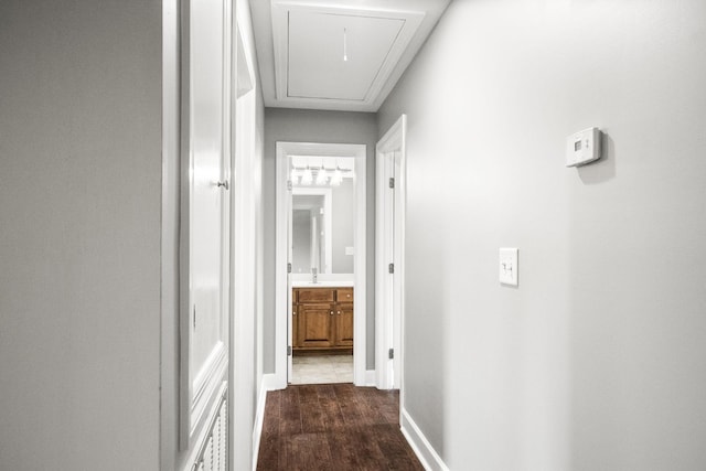 corridor featuring dark hardwood / wood-style flooring