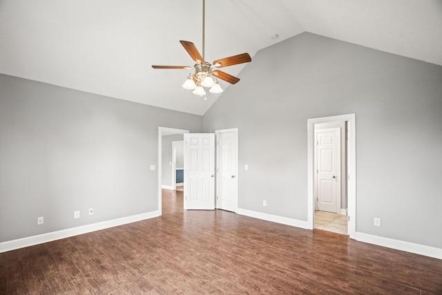 interior space with ceiling fan, wood-type flooring, and high vaulted ceiling