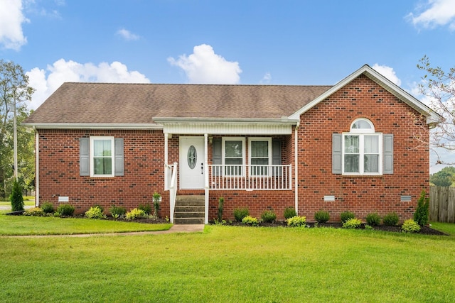 view of front facade featuring a front yard and a porch