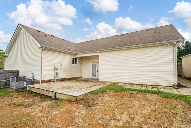 back of property featuring a deck