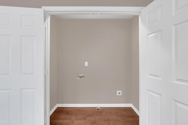 laundry room featuring hookup for an electric dryer, hookup for a washing machine, and hardwood / wood-style floors